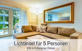 Ferienwohnung Lichtinsel - strandnah, ebenerdig, haustierfreundlich, Südterrasse und Garten, optimal für Familien
